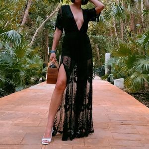 Long black lacy dress with high-slit